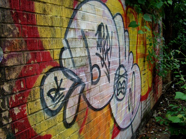 Photo of abandoned dock with graffiti by J. Downs